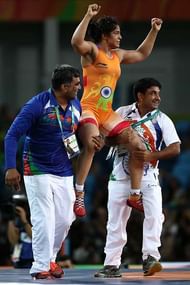 RIO DE JANEIRO, BRAZIL - AUGUST 17:  Sakshi Malik of India is declared the winner against Aisuluu Tynybekova of Kyrgyzstan during the Women's Freestyle 58 kg Bronze match on Day 12 of the Rio 2016 Olympic Games at Caioca Arena 2 on August 17, 2016 in Rio de Janeiro, Brazil.  (Photo by Lars Baron/Getty Images)